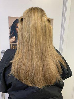 Hair Extensions seamless matched to this client base color and highlights