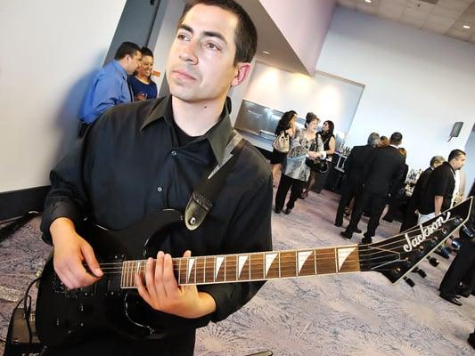 Jazz Guitarist and Instructor Gino Riccardi performing at the Anaheim Convention Center for OCLF's 2014 Awards Ceremony.