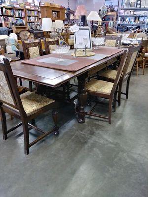 Early 1900's dining table.  Survived the 1902 S.F. Earthquake and fire.