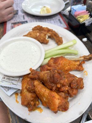 Happy hour wings and chicken fingers plate delicious with perfect amount of sauce and great size, not the tiny little ones.