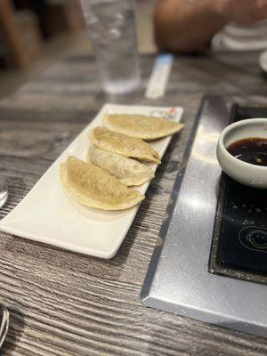 Pan seared dumplings (6 come in the order but we ate 2 before snapping the pic) oops