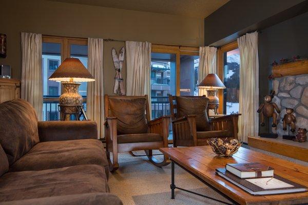 Comfortable and spacious living area with views of Peak 9.