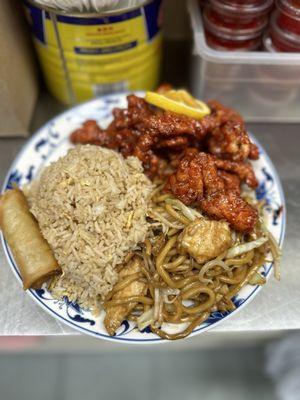 Orange chicken combo with fried rice and add chicken chow mein