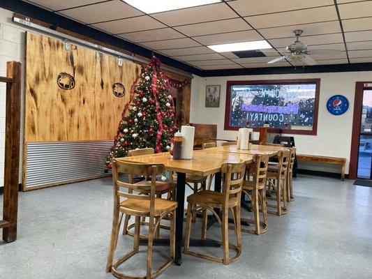 Opposite view of part of dining area, presently being decorated for holidays.