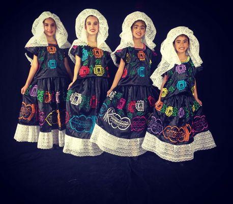 Oaxaca dresses with these beautiful girls.