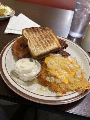 BLT Sandwich and Hash browns with onions and cheese.