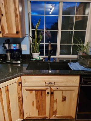 The sink area with counter tops.