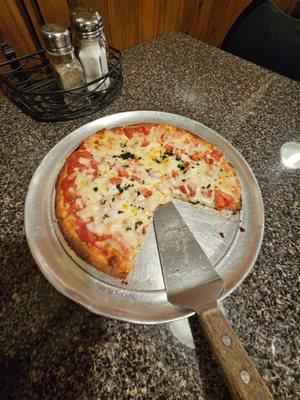 Pizza Margherita on cauliflower crust.