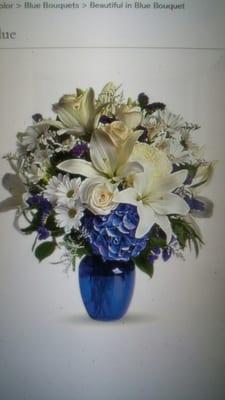 This is the premium "Beautiful in Blue Bouquet" as advertised on the website.