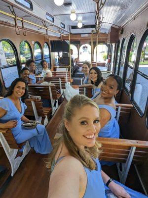 We chartered the 32-seat white trolley, The Swan, for our wedding. Bridespeople, bride, and driver.