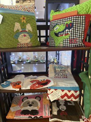 Hand quilted blankets, bags pillows and tee shirts