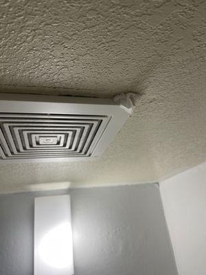 Toilet paper stuffed in vent fan.