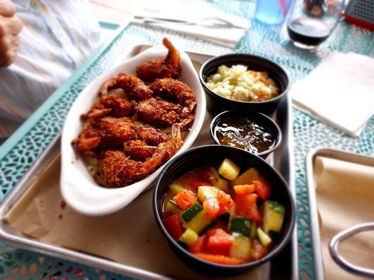 Coconut Shrimp plater with slaw and cucumber tomato salad