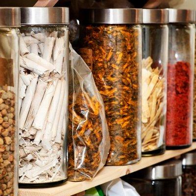 Chinese herbal medicine - Raw herbs in jars for custom formulas