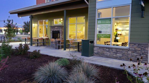 Outdoor patio seating, with fireplace.