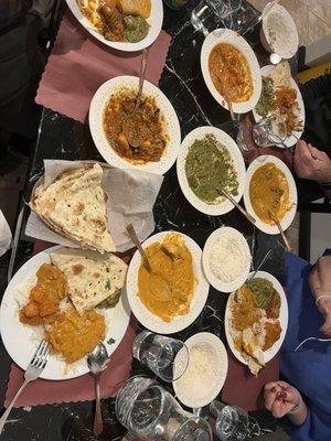 Garlic naan, chicken vindaloo, lamb tikka masala, chicken tikka masala, butter chicken and palak paneer.