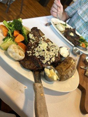 T bone steak with baked potato