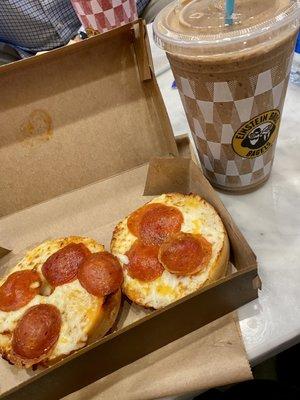 Pepperoni pizza bagel with a chocolate cold brew