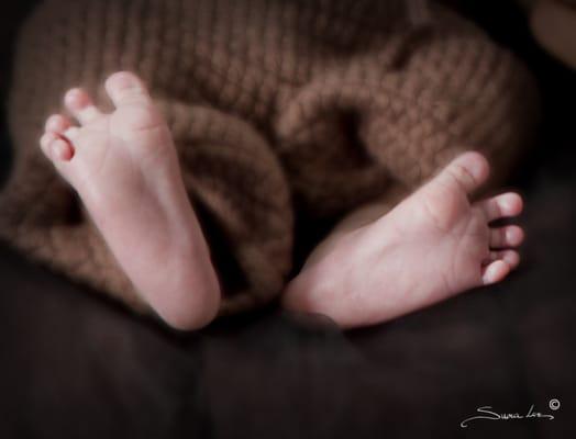 Our son's feet photographed by Suna Lee