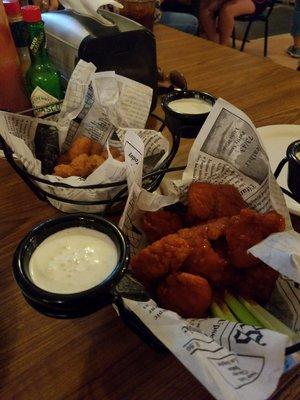 Boneless wings and fried cheese.