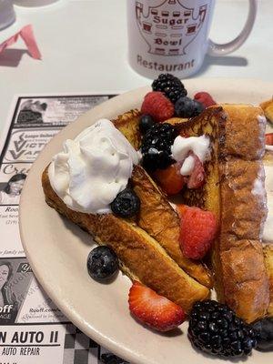 French toast with fresh berries and whipped cream, yummy