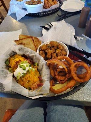 Crawfish stuffed baked potato,fried okra and onion rings