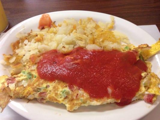 Western omelette (comes with toast not pictured) - 3 eggs with green pepper, onions, cheese, and tomato sauce