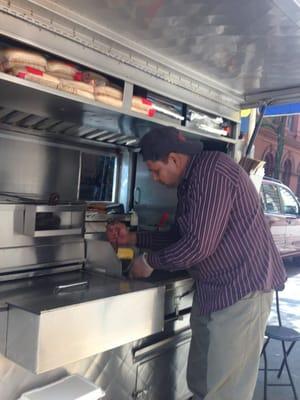 Hard at work making tasty Halal food!