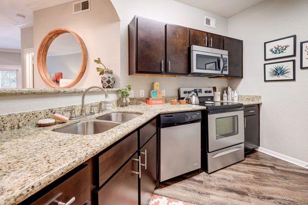 Open kitchen with stainless appliances