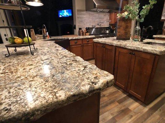 CUSTOM- Granite counter tops with a rustic chiseled edge profile