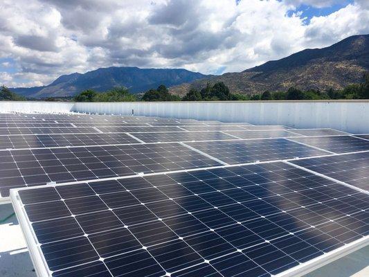 Flat roofs are perfect for solar! Check out this gorgeous array on ballasted racking.