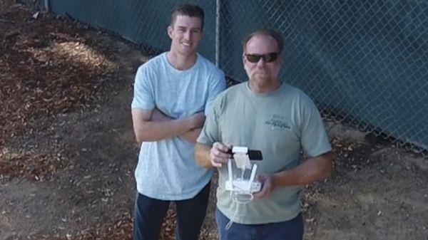 My son and I flying our drone together.