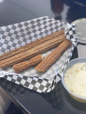 Churros: strawberry , cream, caramel