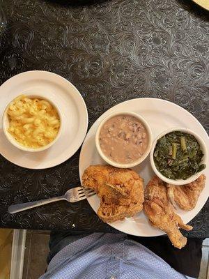 Fried Chicken, black eyed peas, collards and Mac and cheese.