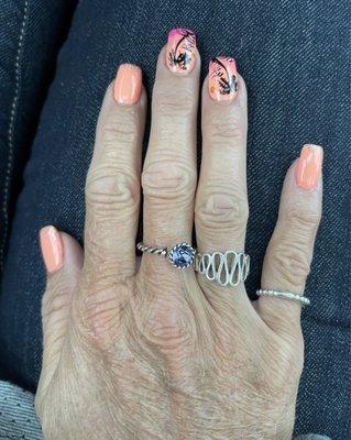 Palm trees with ombré and a little glitter with a new color she just got in.  I brought the coral color and she did the rest!  Love it!