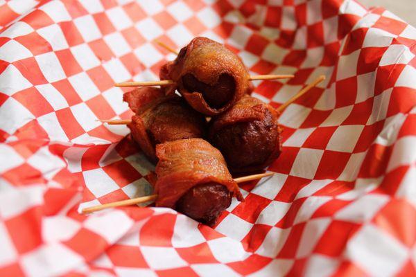 Dog Nuts! Bacon wrapped meatballs that we could eat but let's spoil our furry friends. 0.75 cents each.