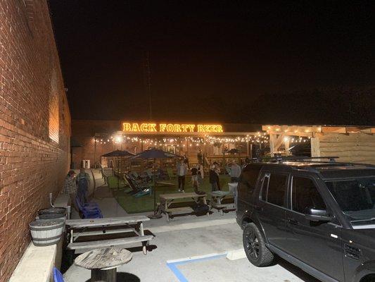 View of the cool outdoor space from the parking lot