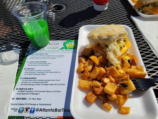 Green Mimosa, egg and cheese biscuit with potatoes