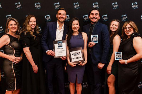 Left to right: Aleta, Feather, Dr. Philip, Dr. Kat, Natalie and Melissa. Posing in front of the Best of Reno Red Carpet