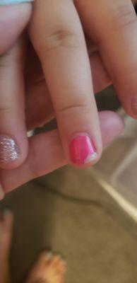 My other daughter's "gel manicure," 2-3 days after. So much for pretty nails for the first day of school!