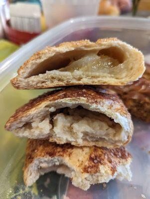 Cross section of the empanadas: top piña (pineapple) and bottom arroz (rice pudding)