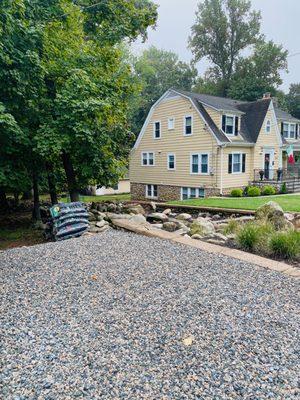 2nd driveway parking spot area with crushed stone mix.