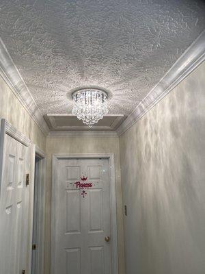 Hallway chandelier and dining room chandelier.