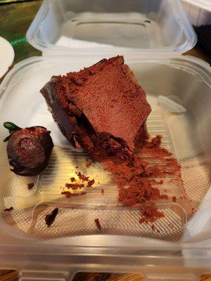 Red velvet cheesecake and chocolate covered strawberry.  My birthday gift compliments of the restaurant.  Delicious