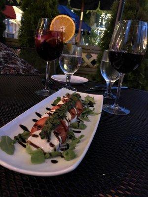 Caprese salad with sangria and Chianti. Very tasty, loved the pesto!