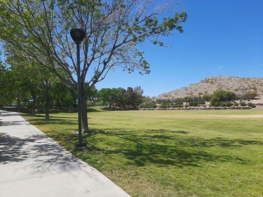 The Paseo Walking Path with Goett Family Park in the spring of 2024.