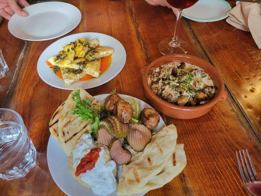 Tortilla Espanola (back), mushrooms(right) and Merguez Sausage (front).