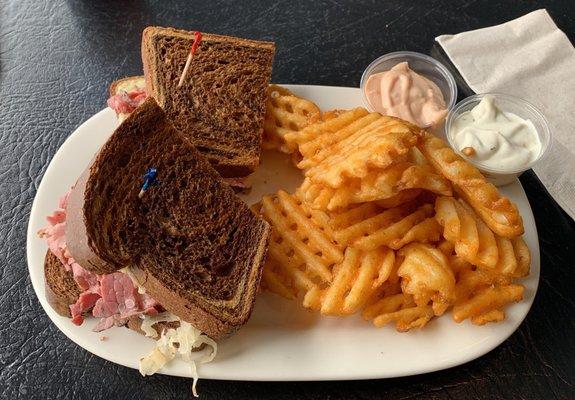 Pastrami Rueben with waffle fries. Delicious!