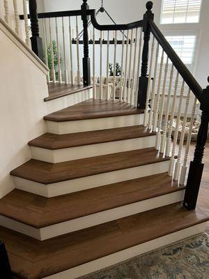 Core-Tec WPC 100% Waterproof, Color: Grande Petronas Staircase with White Risers.