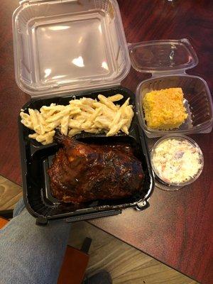 Half barbecue chicken with Alfredo mac & cheese, fresh hot corn bread, and pineapple coleslaw